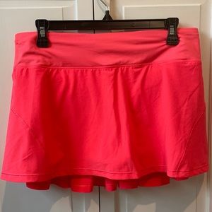 Lululemon Womens circuit breaker skirt size 8 in bright pink.